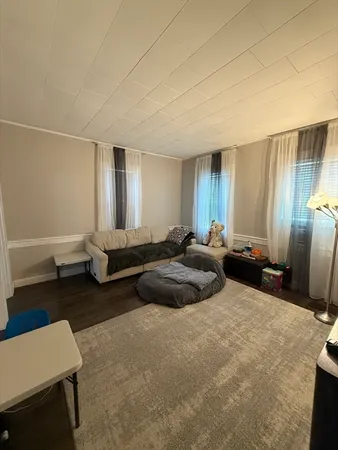 a living room with furniture and a couch