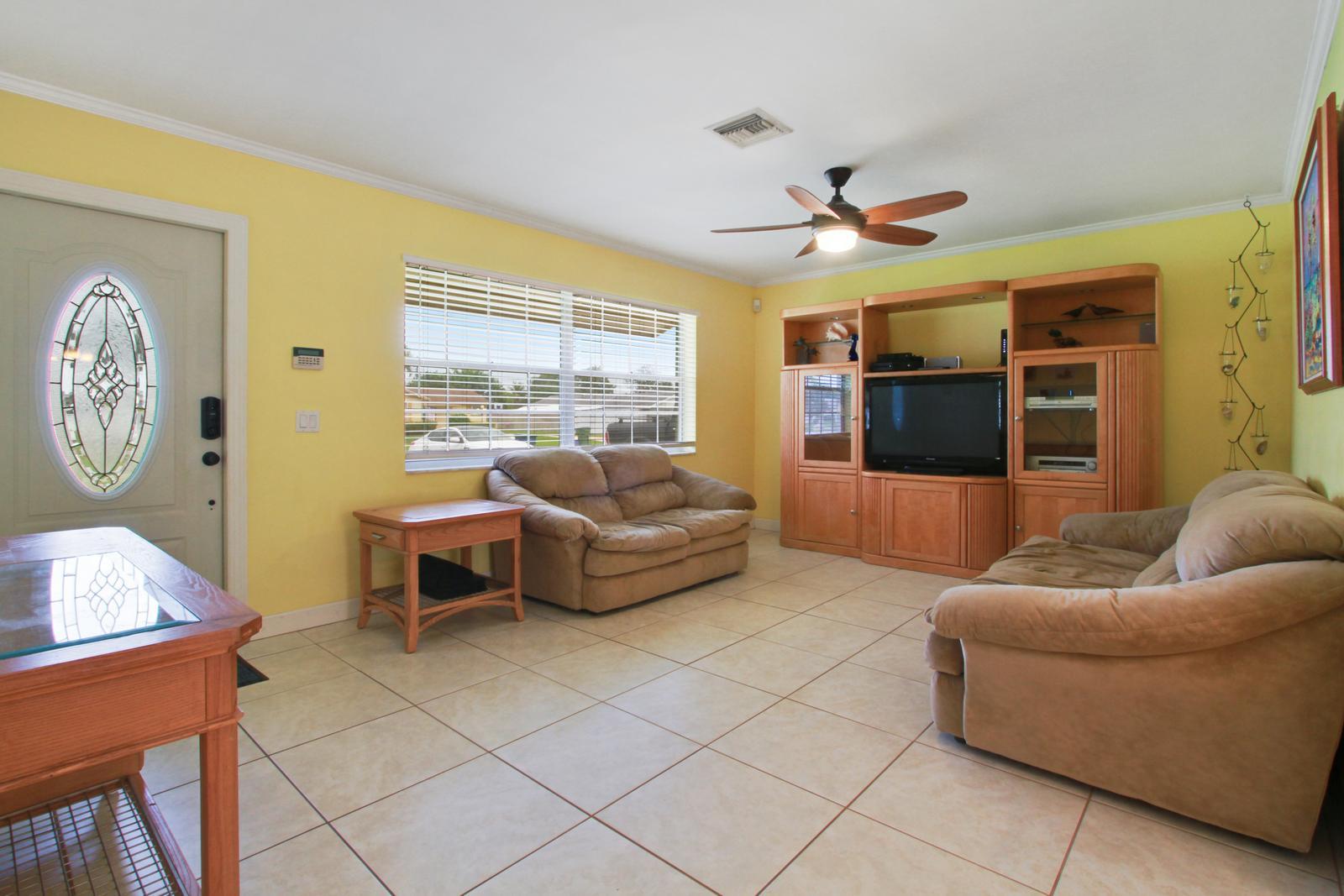 444 Davis Road Palm Springs, FL 33461 - Photo 5 of 14 4_living_room