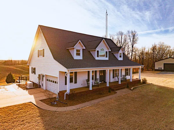 a front view of a house with entertaining space