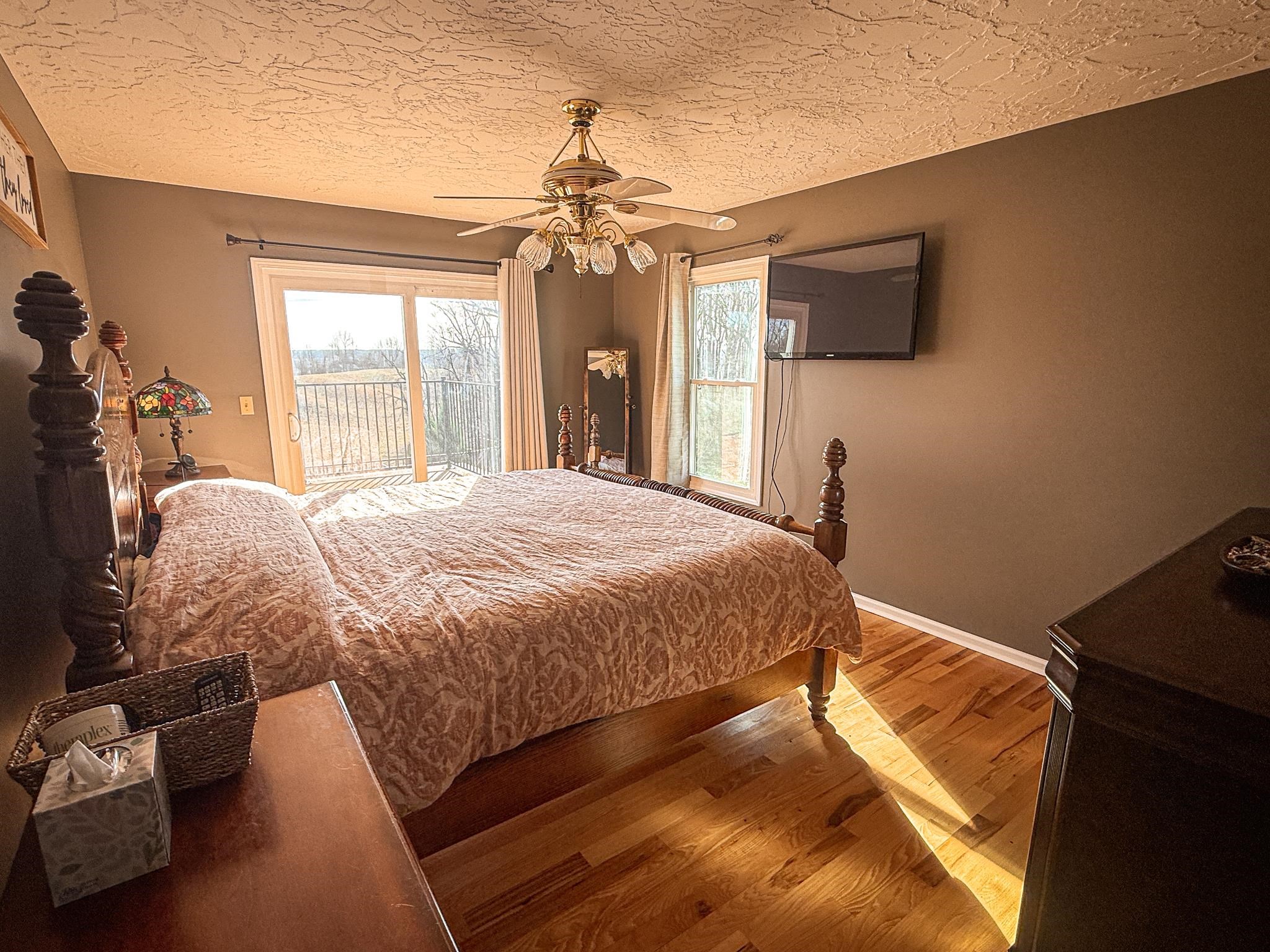 5030 Rogers Marshall Road Union City, TN 38261 - Photo 31 of 40 a bed sitting in a bedroom and tv