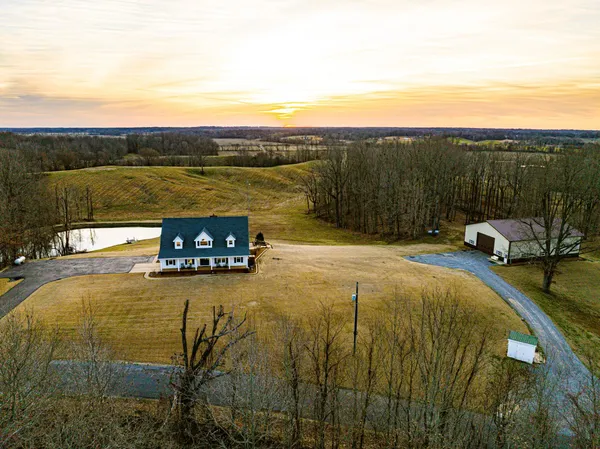 a view of a lake with a yard