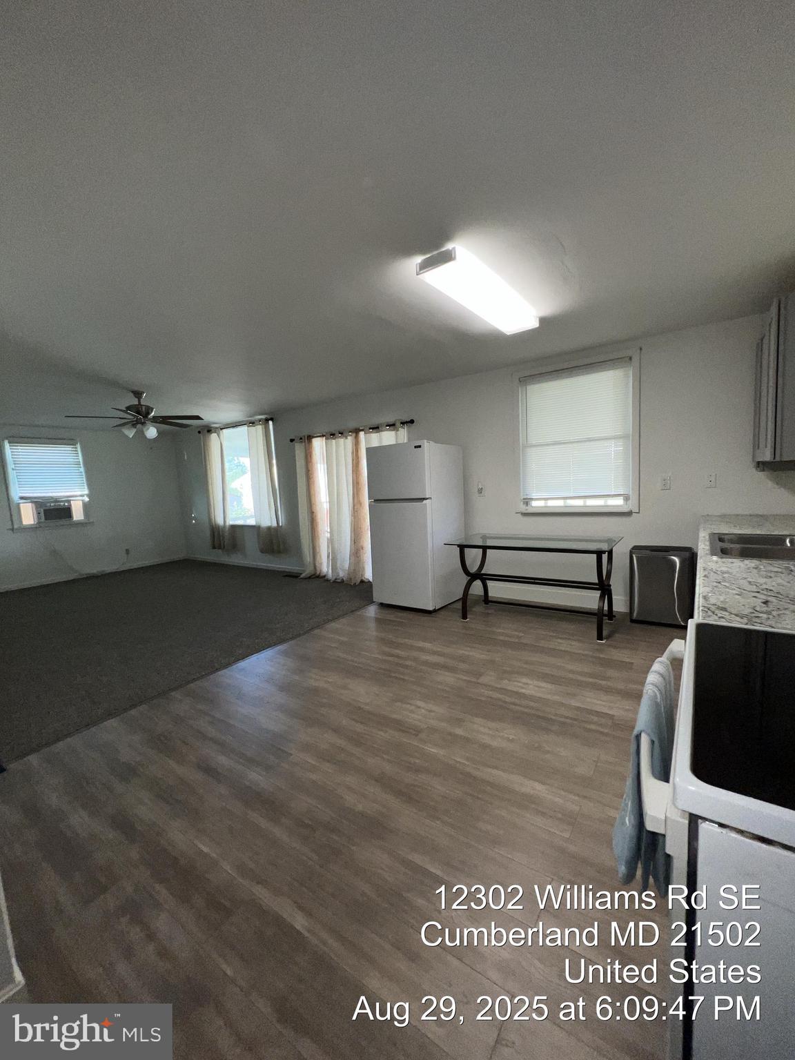 12302 Williams Road Southeast Cumberland, MD 21502 - Photo 21 of 35 a view of a kitchen and an empty room