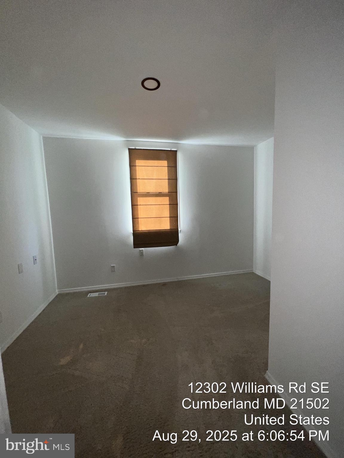12302 Williams Road Southeast Cumberland, MD 21502 - Photo 27 of 35 a view of an empty room and a window