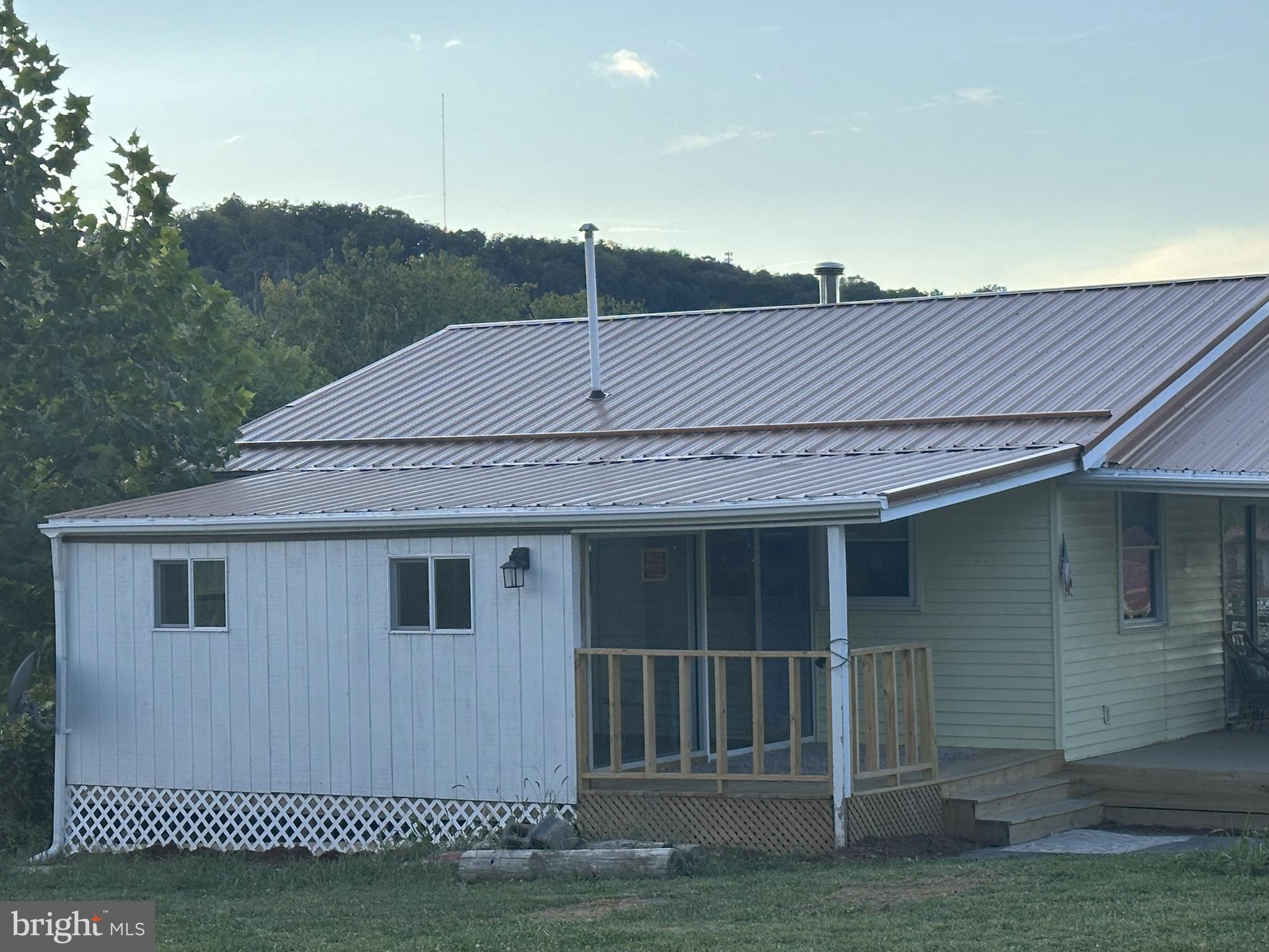 12302 Williams Road Southeast Cumberland, MD 21502 - Photo 34 of 35 a house that has a tree in front of it