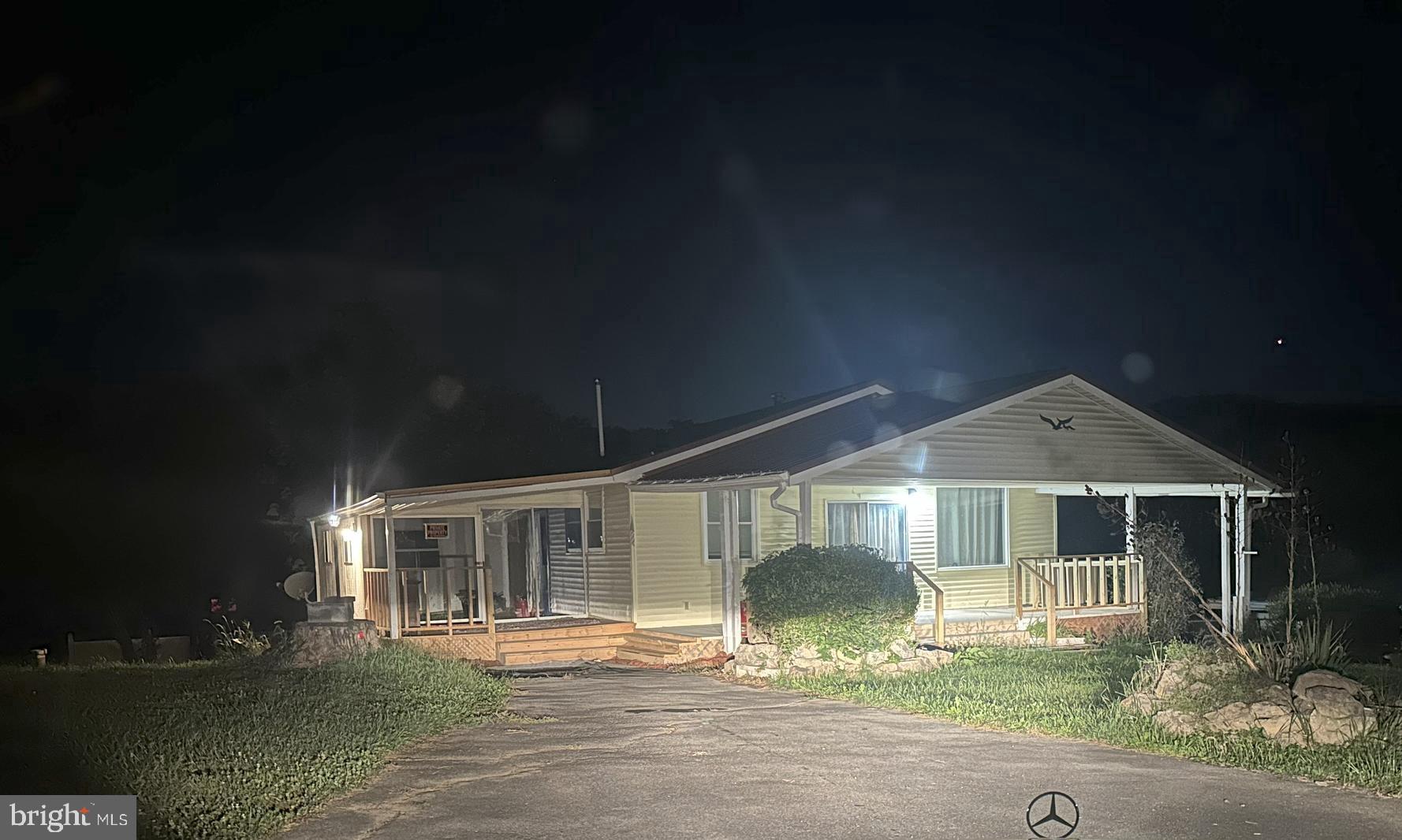 12302 Williams Road Southeast Cumberland, MD 21502 - Photo 4 of 35 a front view of a house with a yard