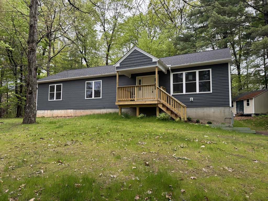 132 Kibbe Road East Longmeadow, MA 01028 - Photo 1 of 32 a front view of a house with garden