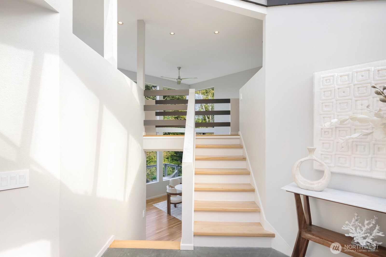 1932 Northwest 98th Street Seattle, WA 98117 - Photo 20 of 40 a view of entryway with furniture and wooden floor