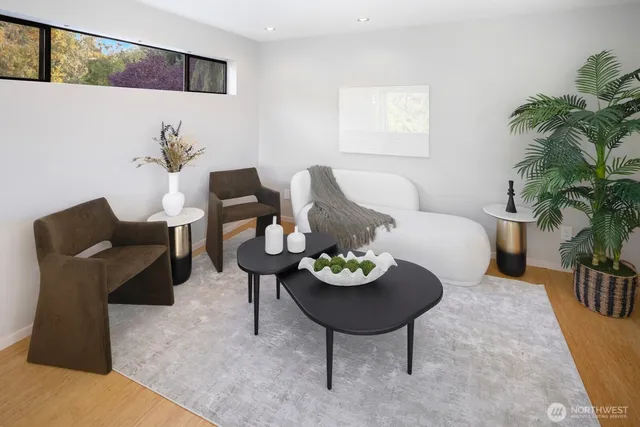 a living room with furniture and a table