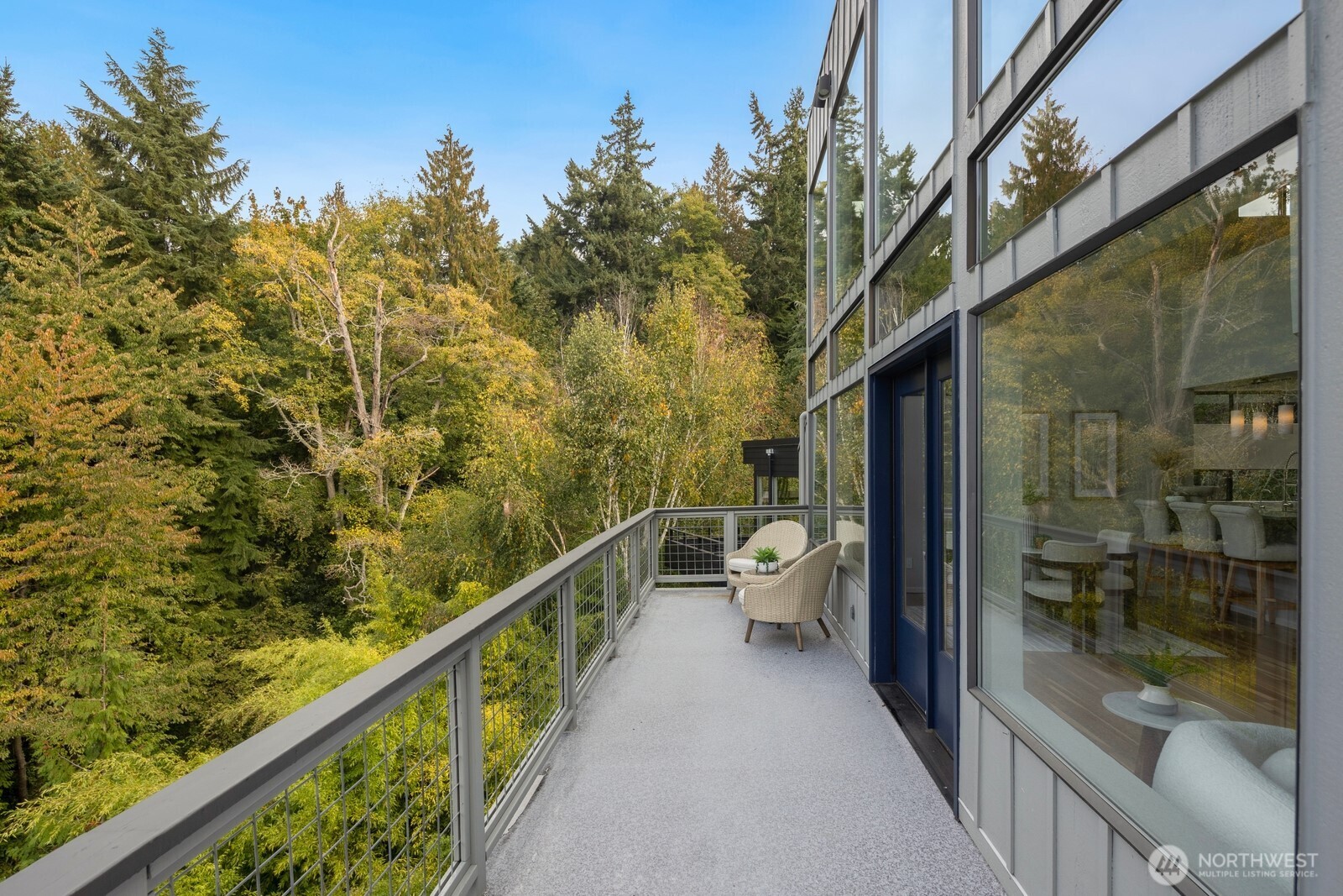 1932 Northwest 98th Street Seattle, WA 98117 - Photo 26 of 40 a city view from a balcony with outdoor seating