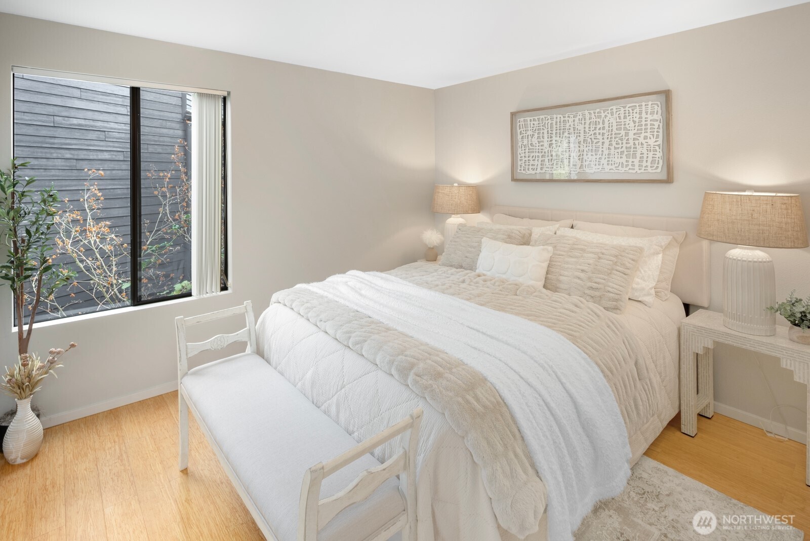 1932 Northwest 98th Street Seattle, WA 98117 - Photo 30 of 40 a bedroom with a bed and a large window