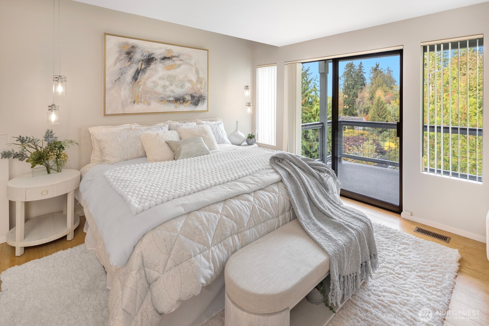 1932 Northwest 98th Street Seattle, WA 98117 - Photo 33 of 40 a bedroom with a large bed and a painting on the wall