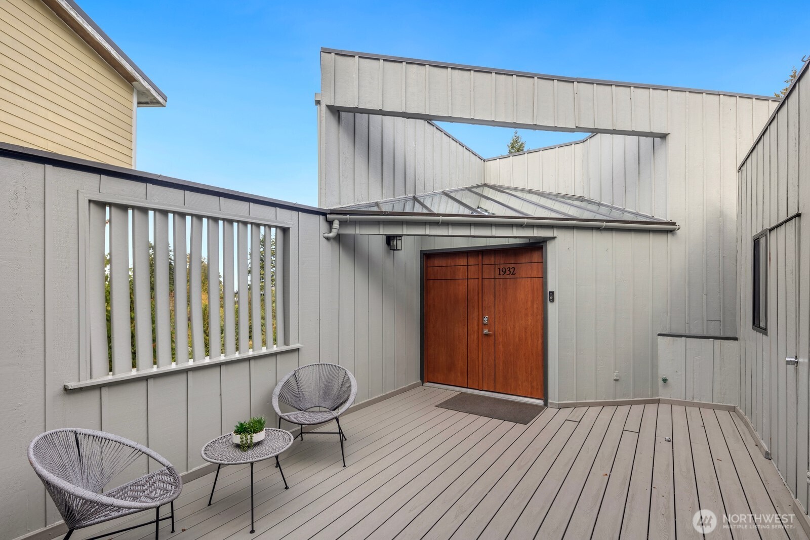 1932 Northwest 98th Street Seattle, WA 98117 - Photo 6 of 40 a backyard of a house with table and chairs