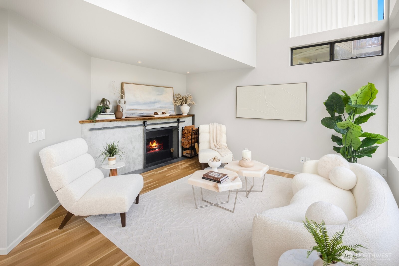 1932 Northwest 98th Street Seattle, WA 98117 - Photo 9 of 40 a living room with furniture and a potted plant
