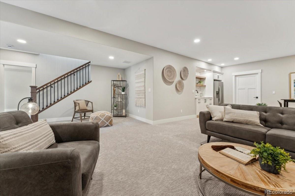 1361 Art Drive Berthoud, CO 80513 - Photo 31 of 40 a living room with furniture and a large window