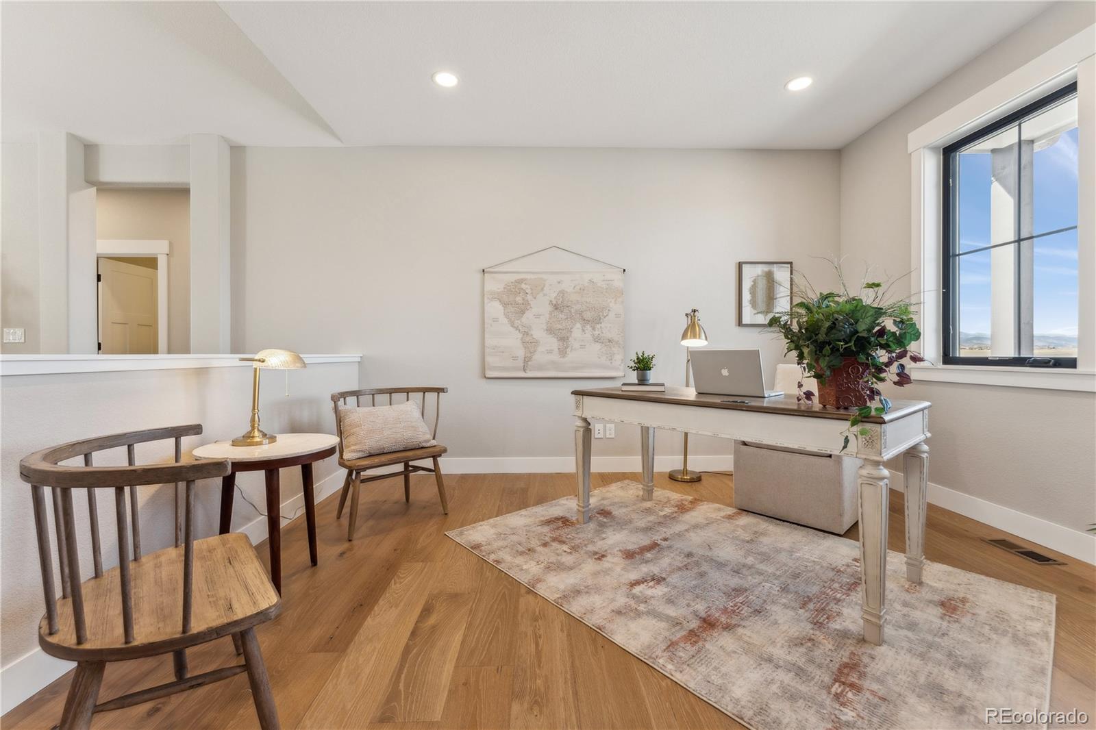 1361 Art Drive Berthoud, CO 80513 - Photo 10 of 40 a view of a dining room with furniture
