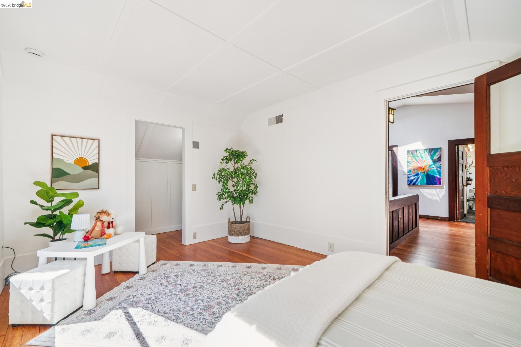 813 San Diego Road Berkeley, CA 94707 - Photo 50 of 60 a bedroom with a bed and a potted plant