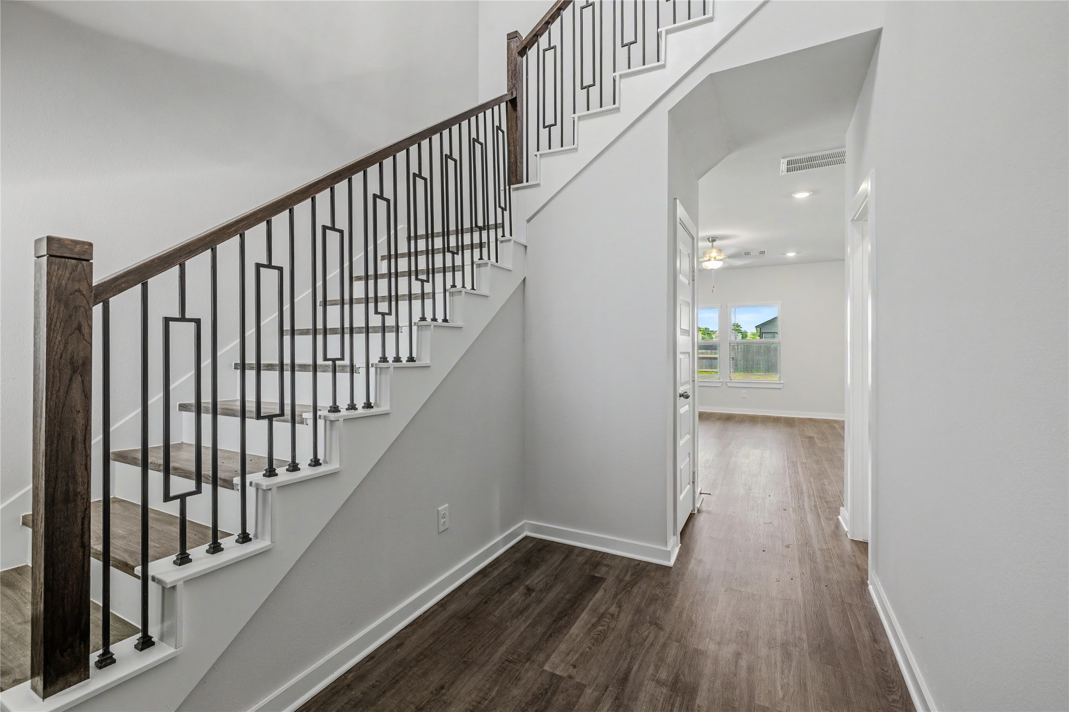 6426 Bolinas Court Rosharon, TX 77583 - Photo 20 of 49 a view of staircase with wooden floor and white walls