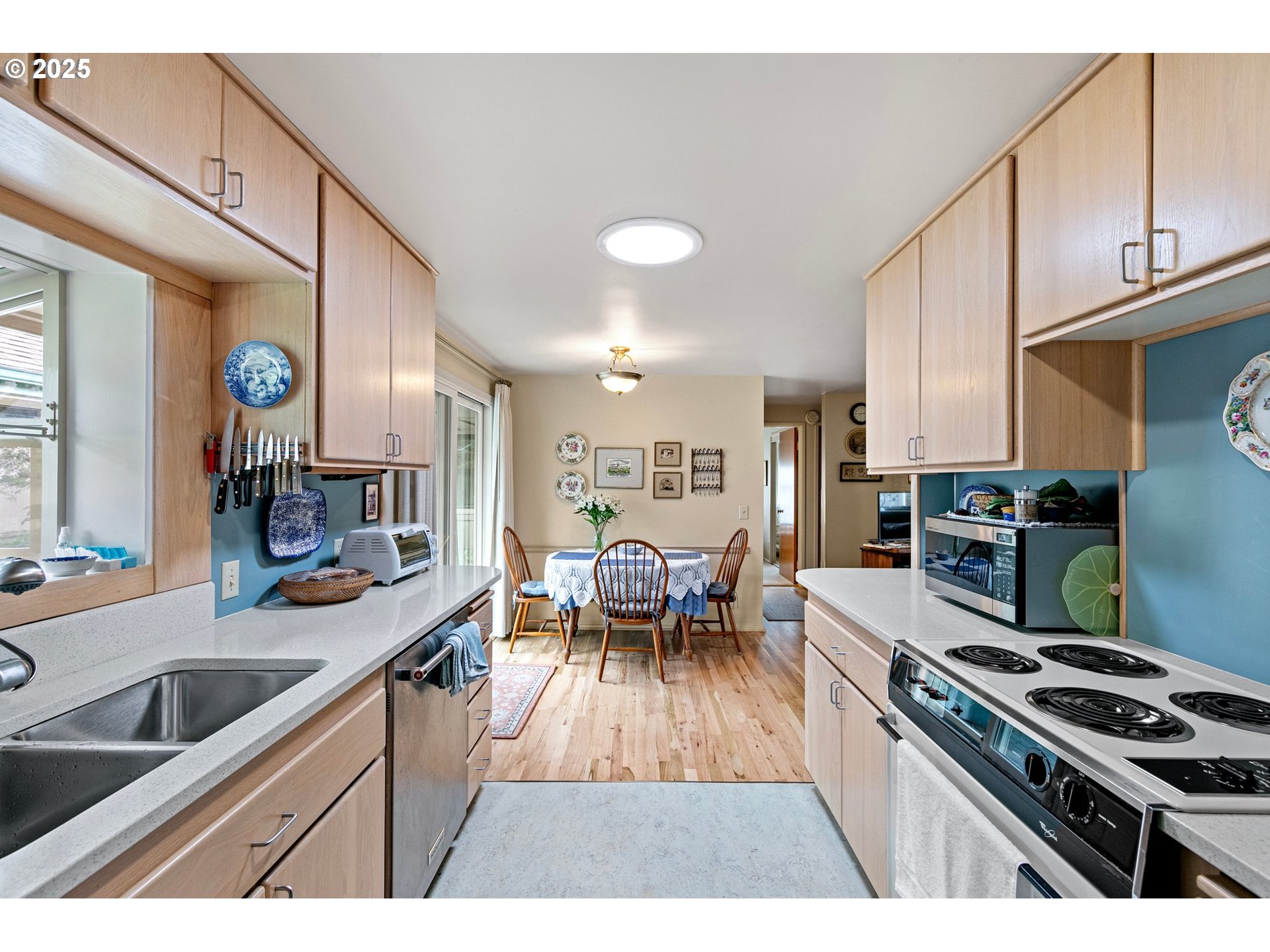 3175 Potter Street Eugene, OR 97405 - Photo 15 of 45 a kitchen with a sink appliances and cabinets