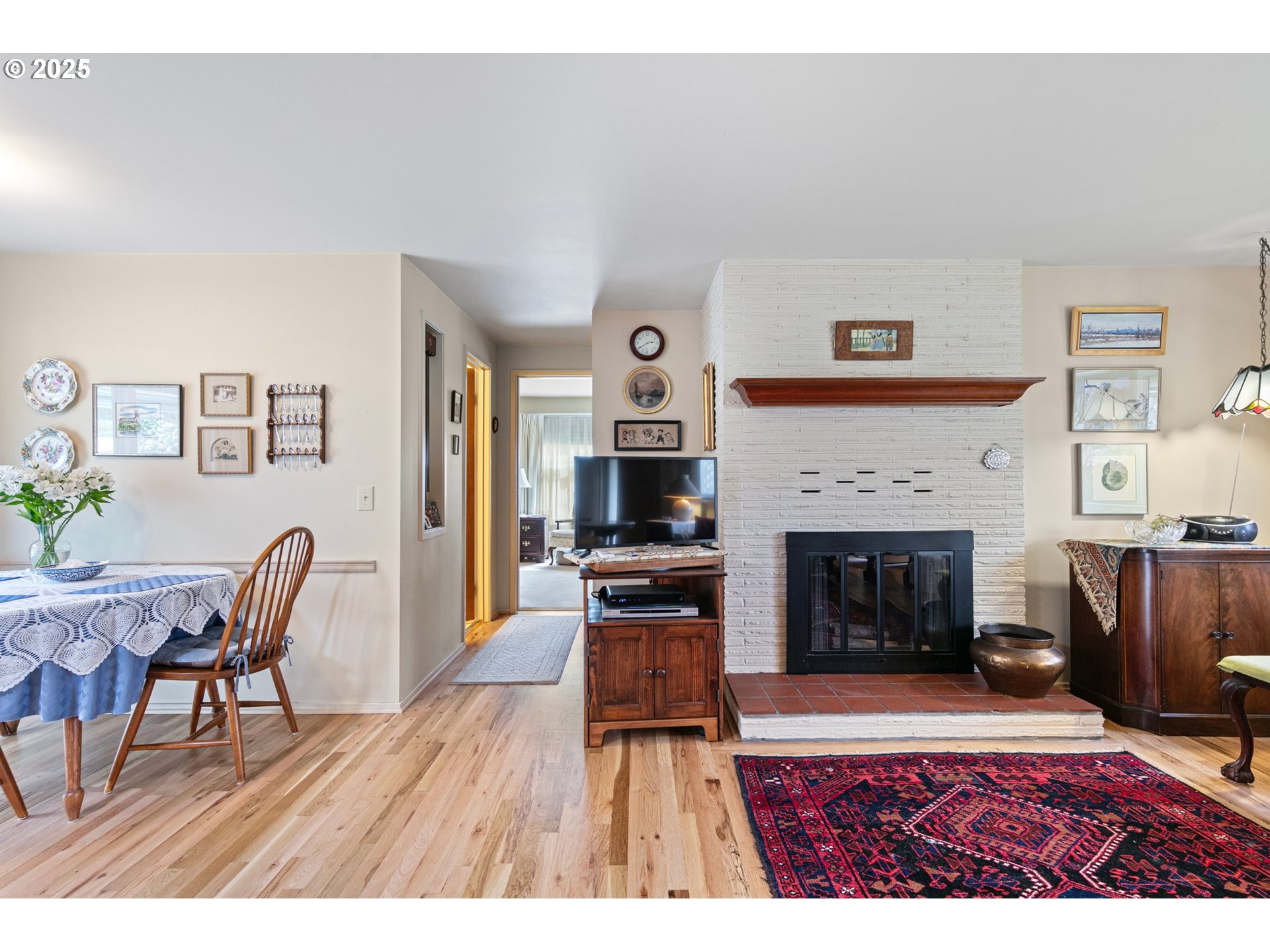 3175 Potter Street Eugene, OR 97405 - Photo 17 of 45 a living room with furniture and a fireplace