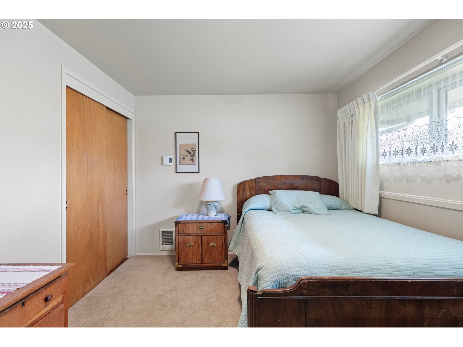 3175 Potter Street Eugene, OR 97405 - Photo 19 of 45 a bedroom with a bed and window