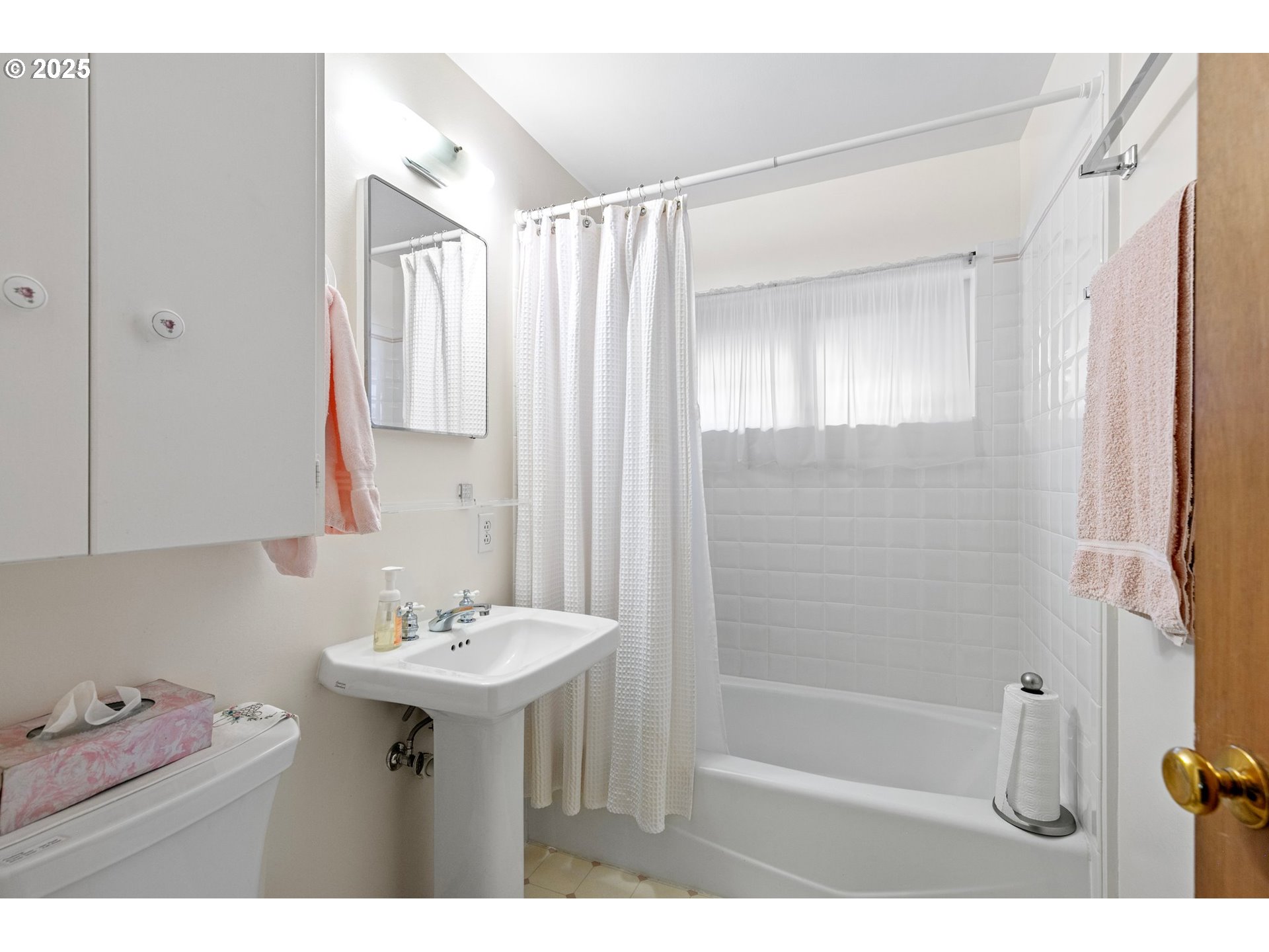 3175 Potter Street Eugene, OR 97405 - Photo 20 of 45 a bathroom with a sink a mirror and a shower