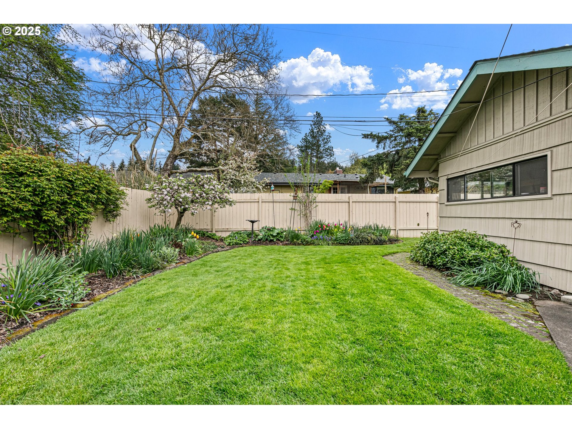 3175 Potter Street Eugene, OR 97405 - Photo 34 of 45 a view of an house with backyard and garden