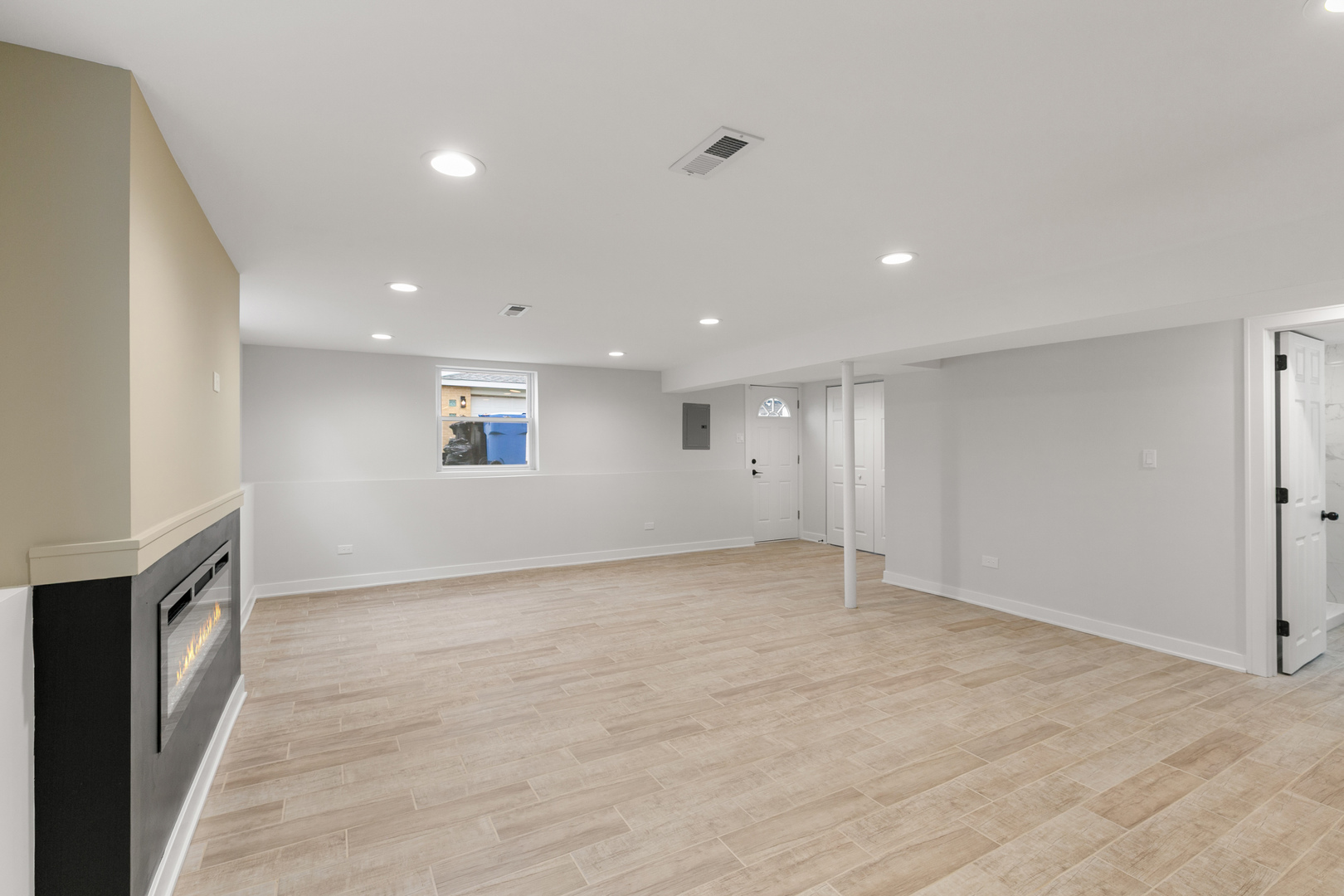 1042 West 109th Place Chicago, IL 60643 - Photo 21 of 24 a view of an empty room with a fireplace