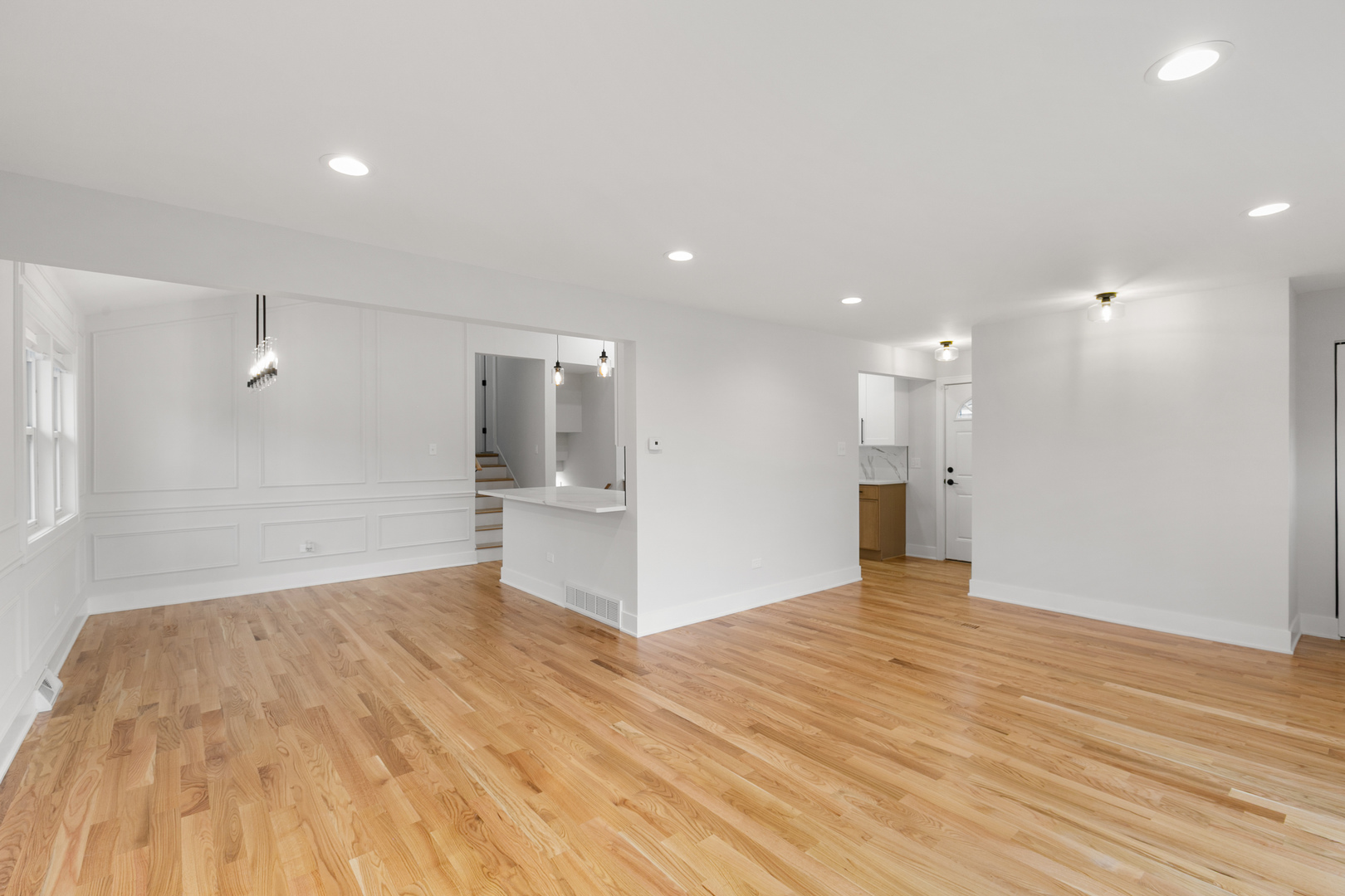 1042 West 109th Place Chicago, IL 60643 - Photo 5 of 24 a view of empty room with wooden floor