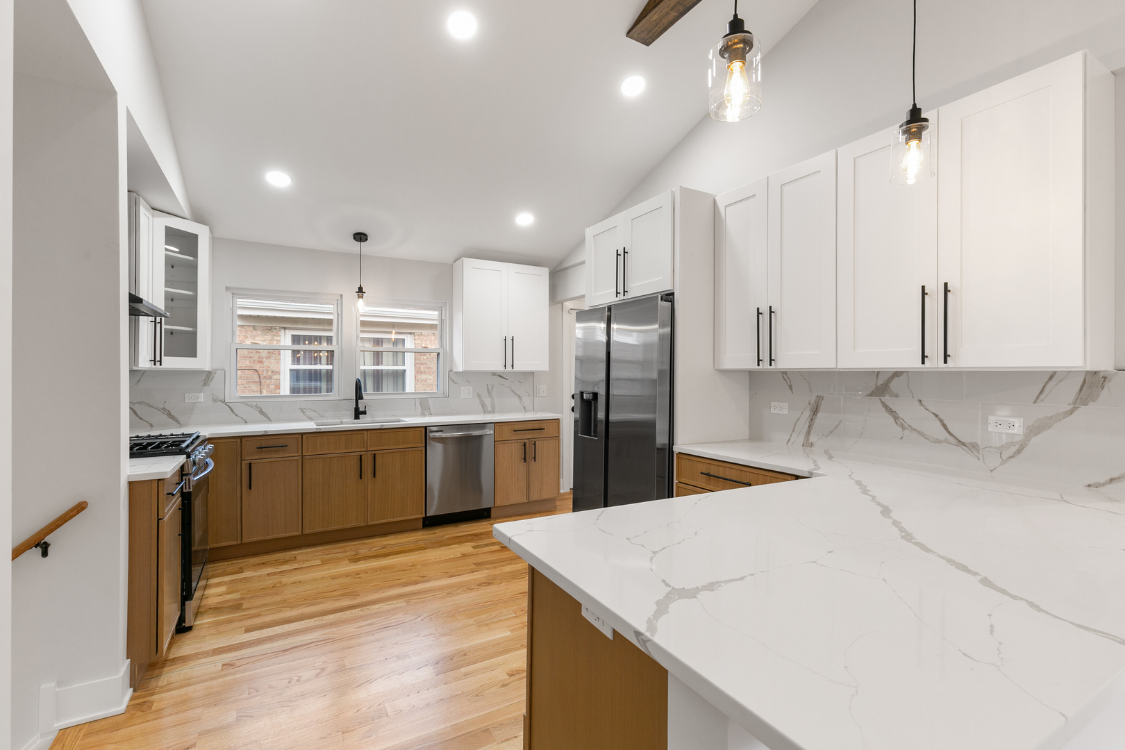 1042 West 109th Place Chicago, IL 60643 - Photo 9 of 24 a kitchen with stainless steel appliances kitchen island granite countertop a refrigerator a sink and a stove