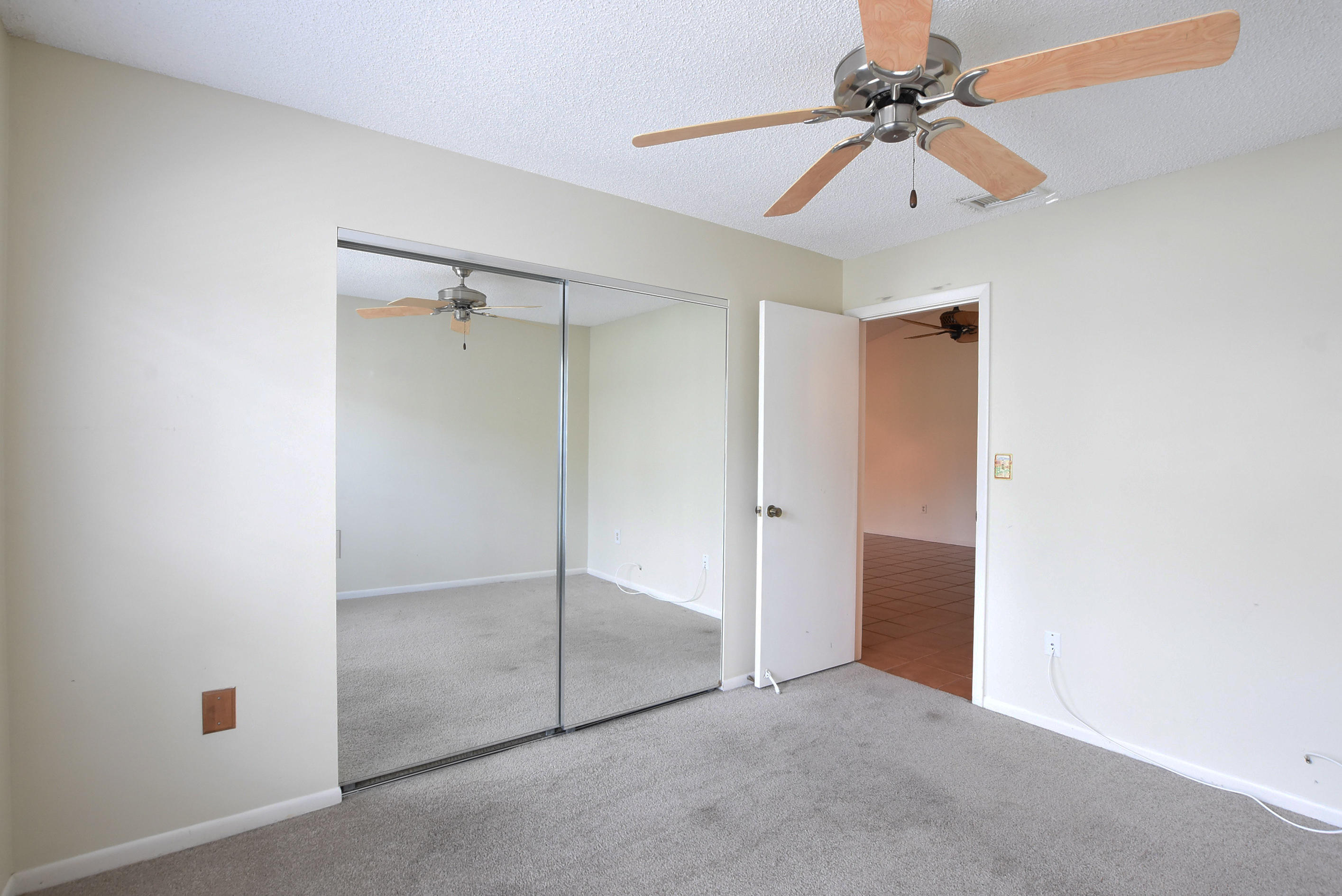 569 Southwest 28th Avenue Delray Beach, FL 33445 - Photo 13 of 25 a view of an empty room