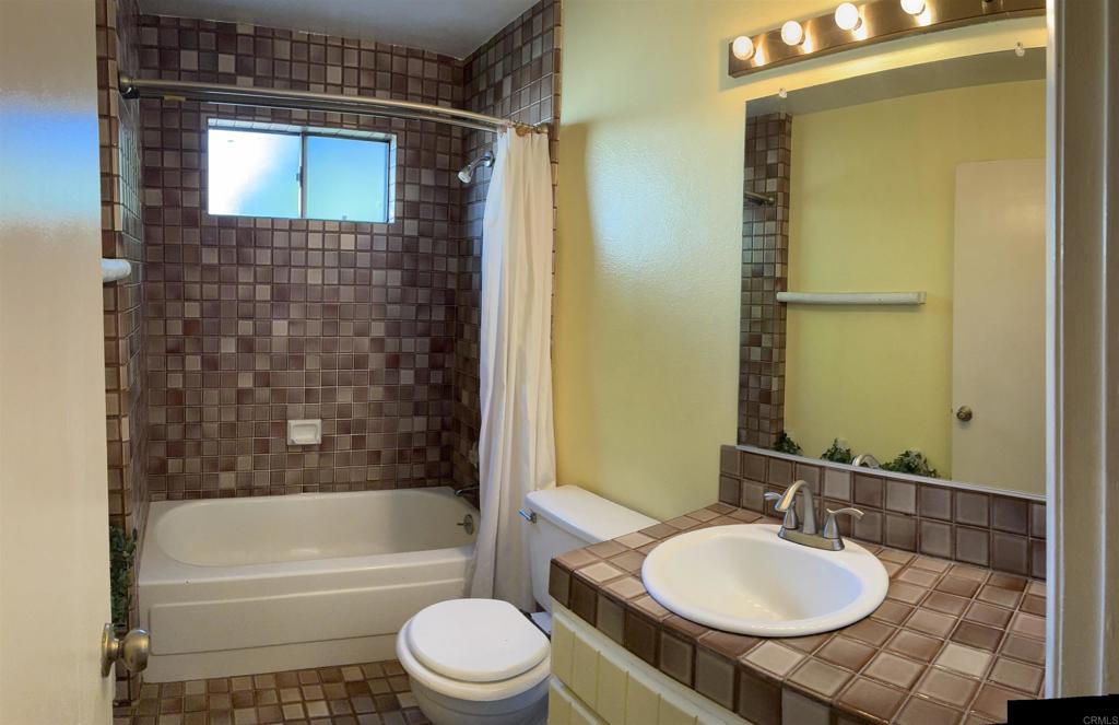 2367 Marshall Way Alpine, CA 91901 - Photo 12 of 13 a bathroom with a sink toilet and shower