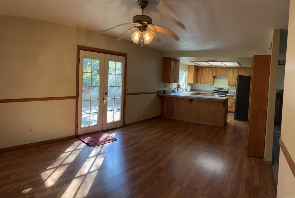 2367 Marshall Way Alpine, CA 91901 - Photo 6 of 13 a kitchen with stainless steel appliances granite countertop a stove and a refrigerator