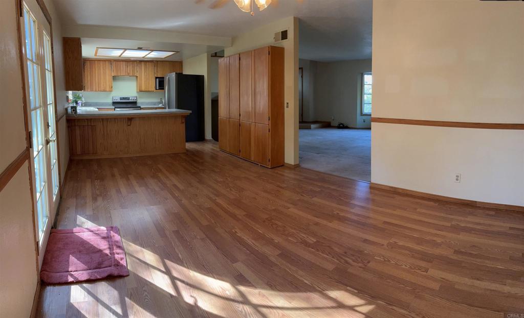 2367 Marshall Way Alpine, CA 91901 - Photo 7 of 13 a kitchen with stainless steel appliances granite countertop a refrigerator and a stove