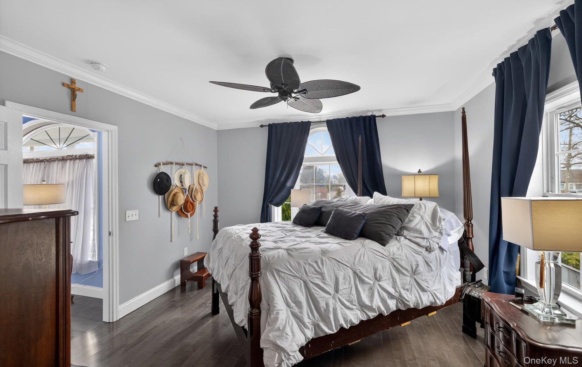 108 Awixa Avenue Bay Shore, NY 11706 - Photo 17 of 47 Bedroom with ornamental molding, dark wood-style floors, and ceiling fan