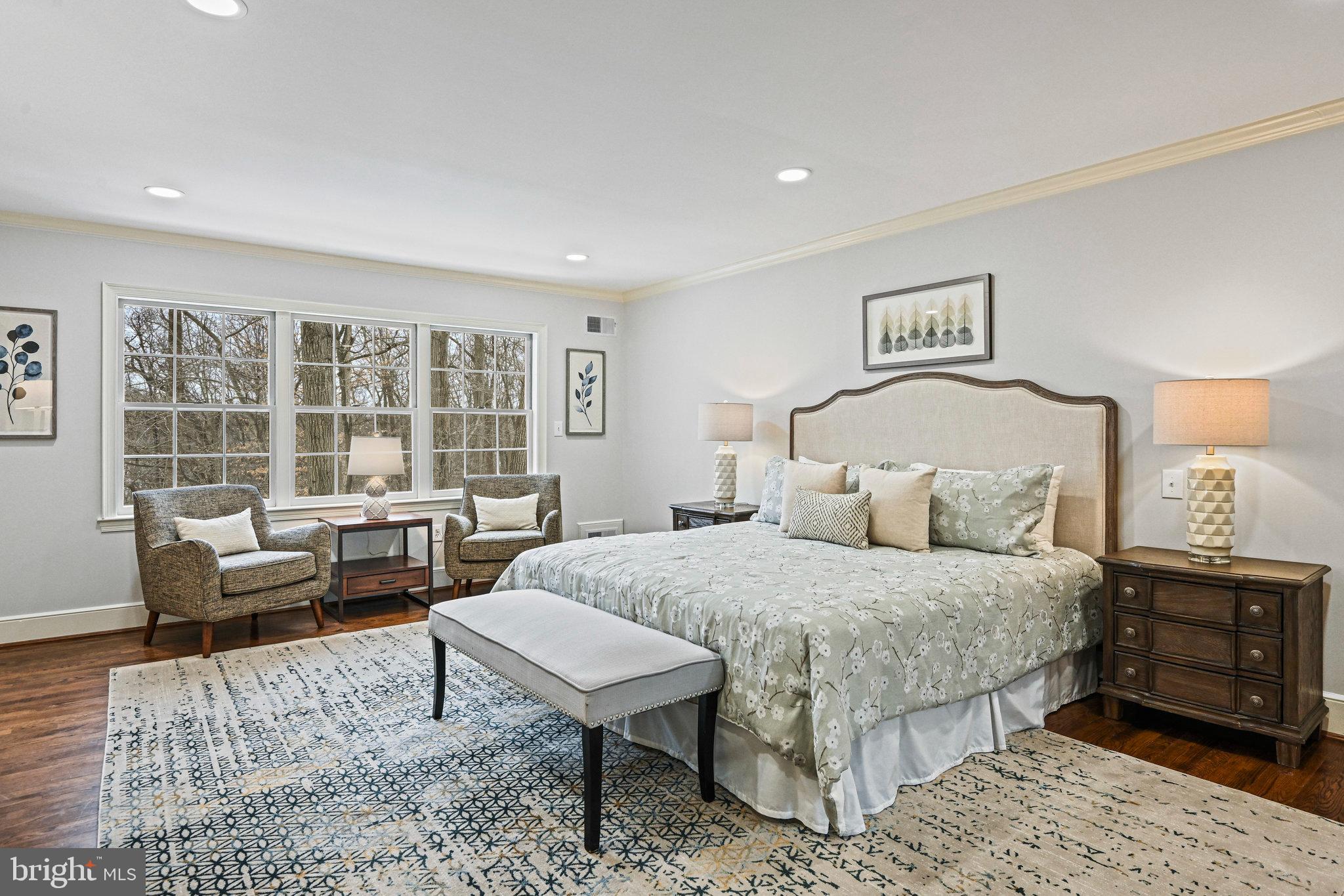 735 Potomac River Road McLean, VA 22102 - Photo 10 of 126 a bedroom with a bed and wooden floor