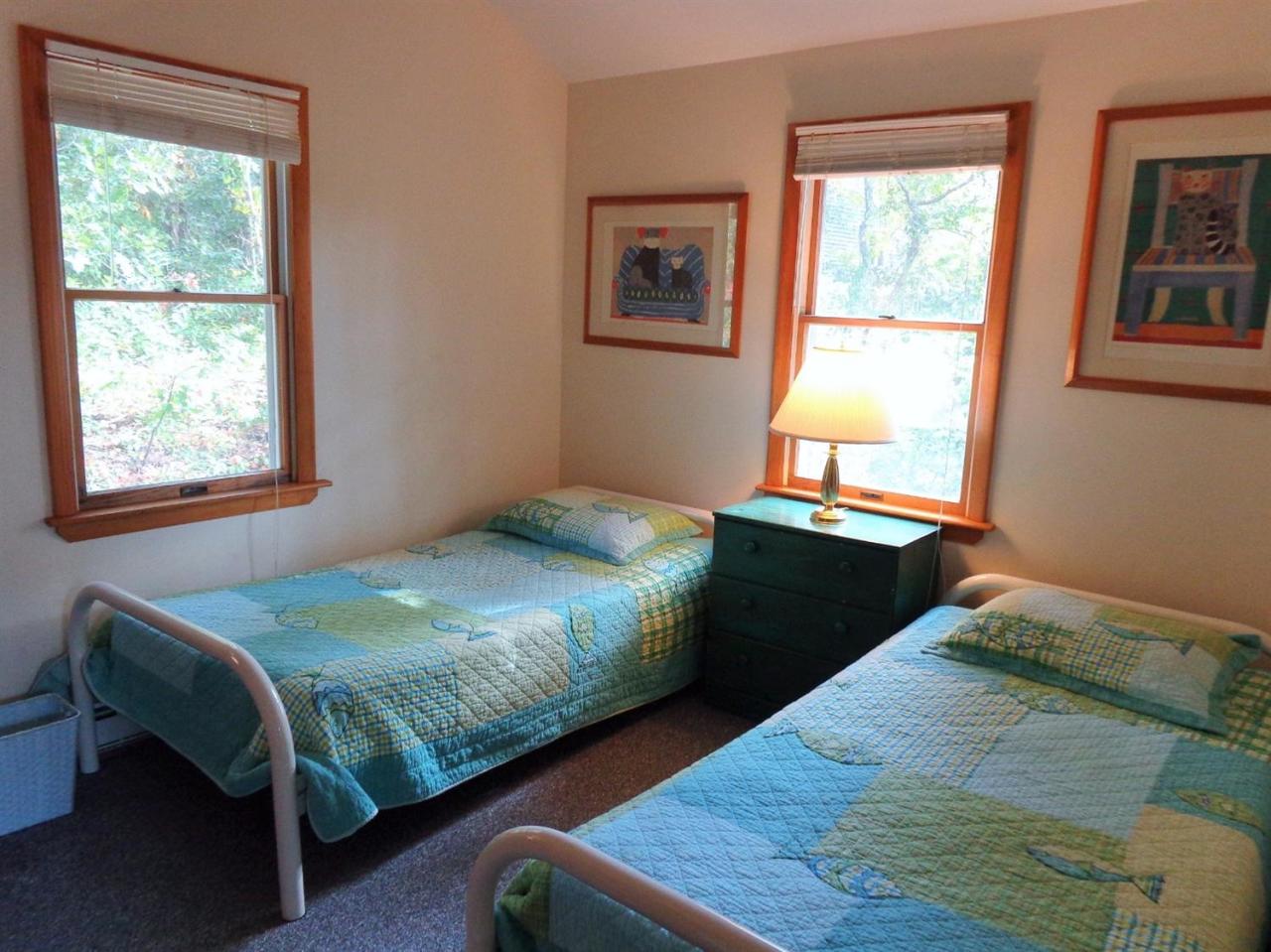 150 Cove View Road Wellfleet, MA 02667 - Photo 19 of 35 a bedroom with a bed and window