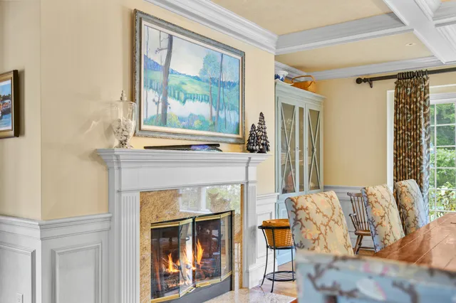 a bathroom with a sink mirror and toilet