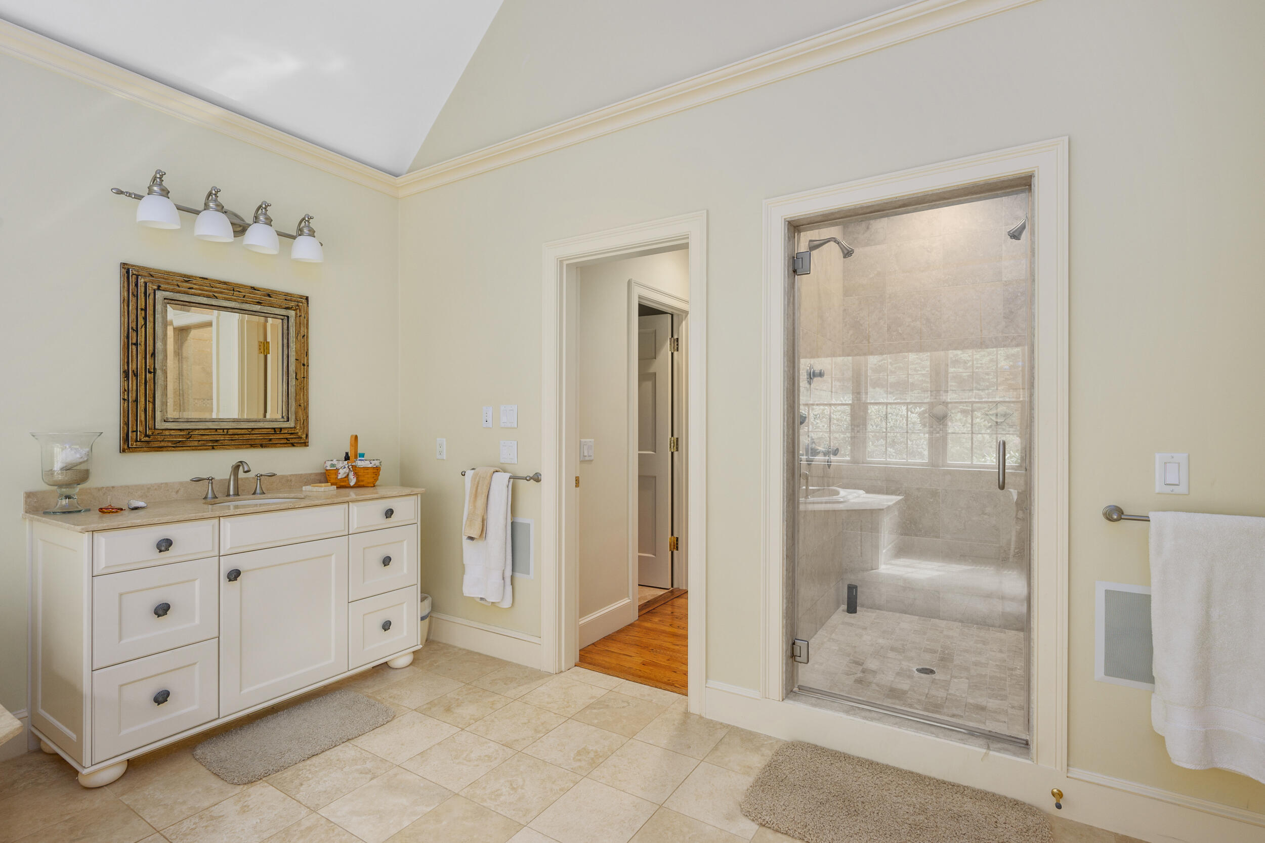 359 Baxter Neck Road Marstons Mills, MA 02648 - Photo 31 of 100 a bathroom with a double vanity sink mirror and shower