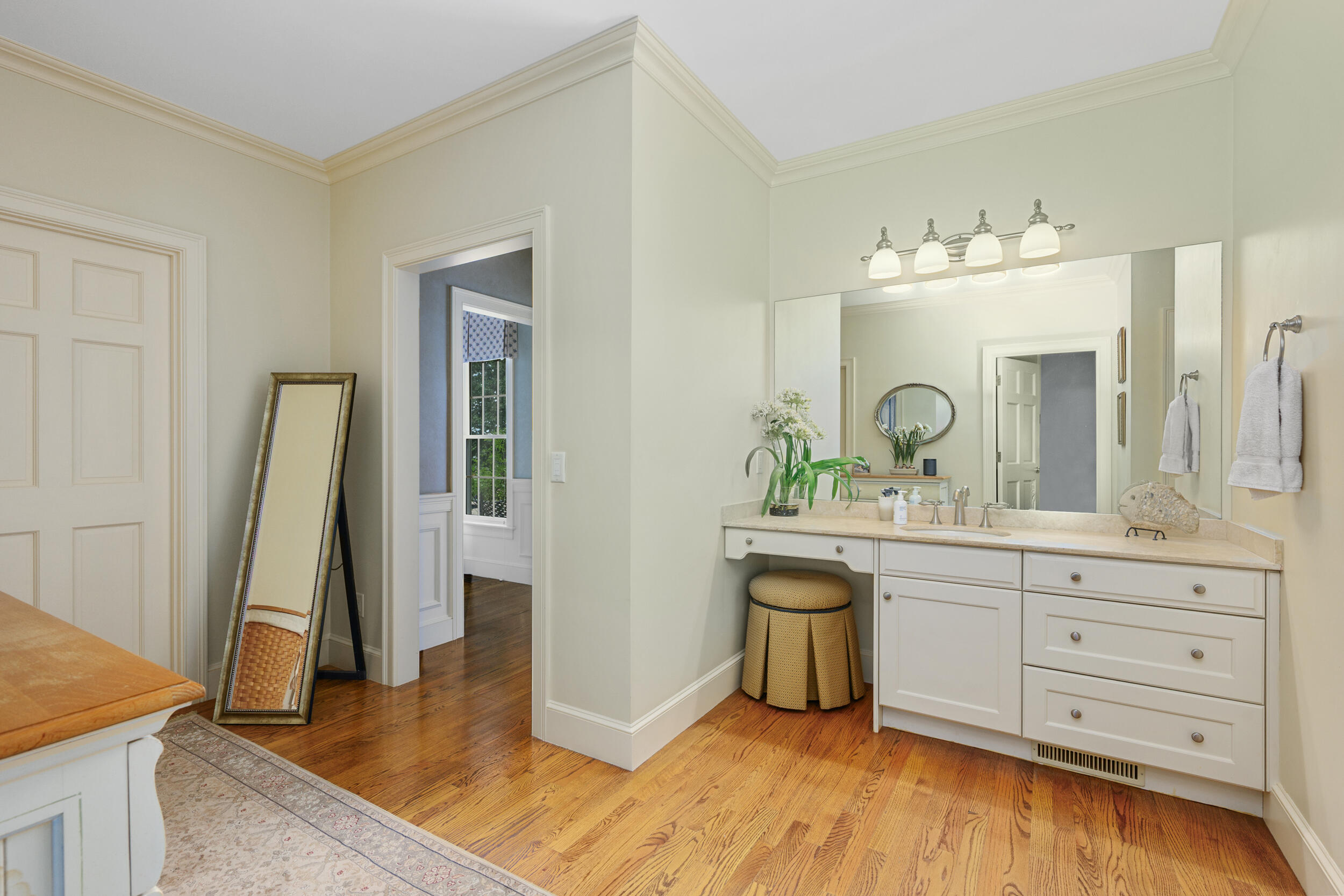 359 Baxter Neck Road Marstons Mills, MA 02648 - Photo 32 of 100 a spacious bathroom with a double vanity sink and a mirror