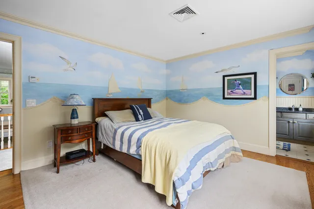 a media room with lots of chairs and a projector