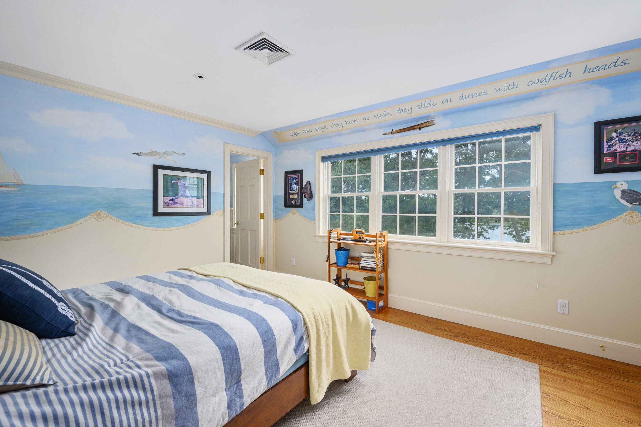 359 Baxter Neck Road Marstons Mills, MA 02648 - Photo 36 of 100 a bedroom with a large bed and a large window