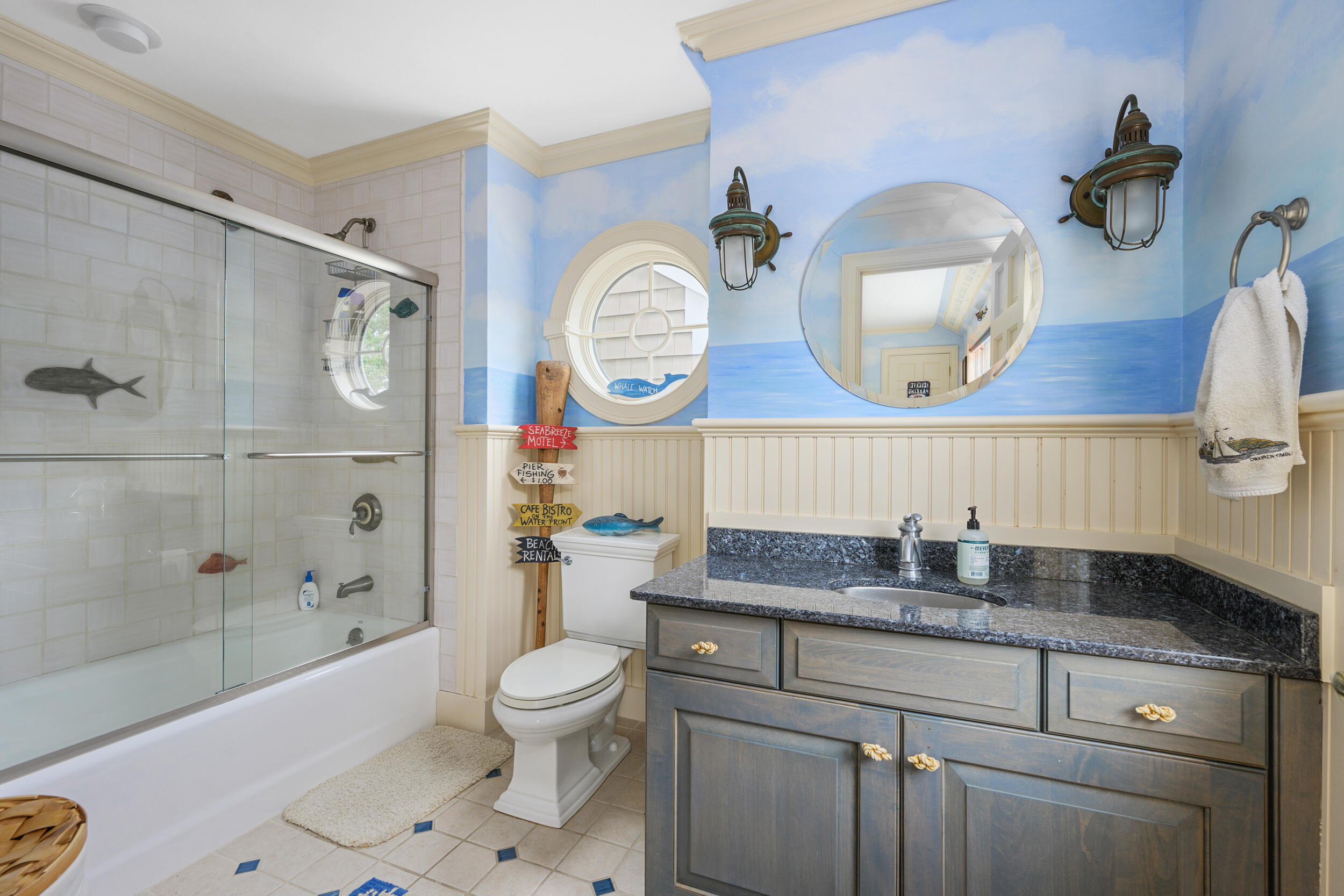 359 Baxter Neck Road Marstons Mills, MA 02648 - Photo 38 of 100 a bathroom with a granite countertop toilet sink and mirror