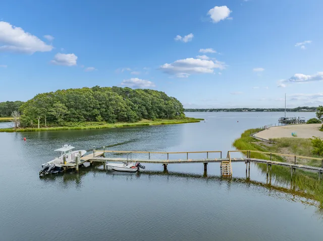 a view of a livingroom with furniture and wooden floor