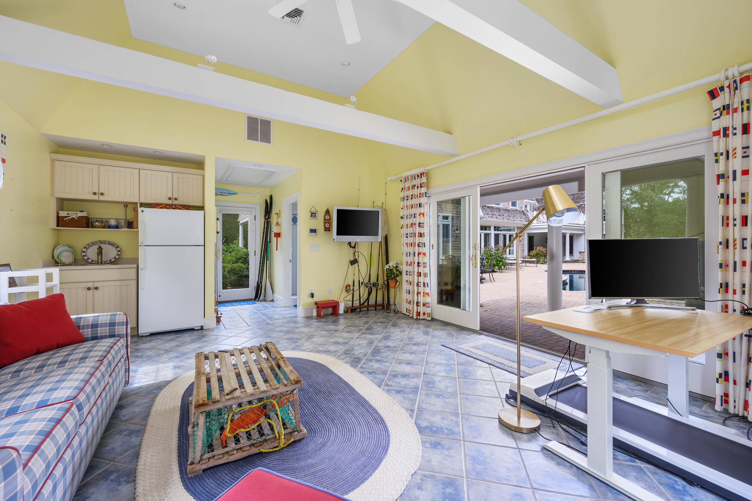 359 Baxter Neck Road Marstons Mills, MA 02648 - Photo 66 of 100 a living room with furniture and a flat screen tv