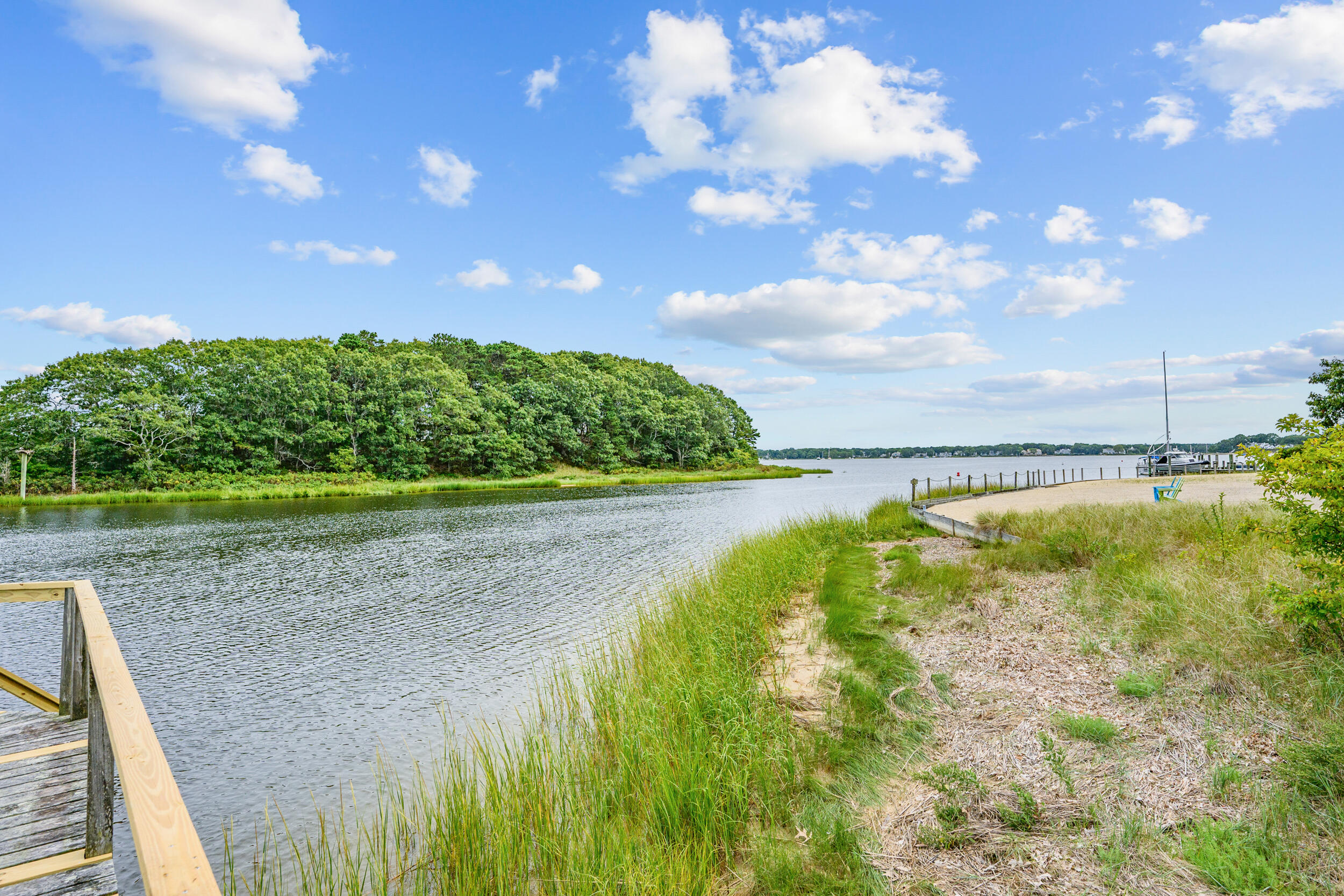 359 Baxter Neck Road Marstons Mills, MA 02648 - Photo 83 of 100 a view of a lake with a big yard