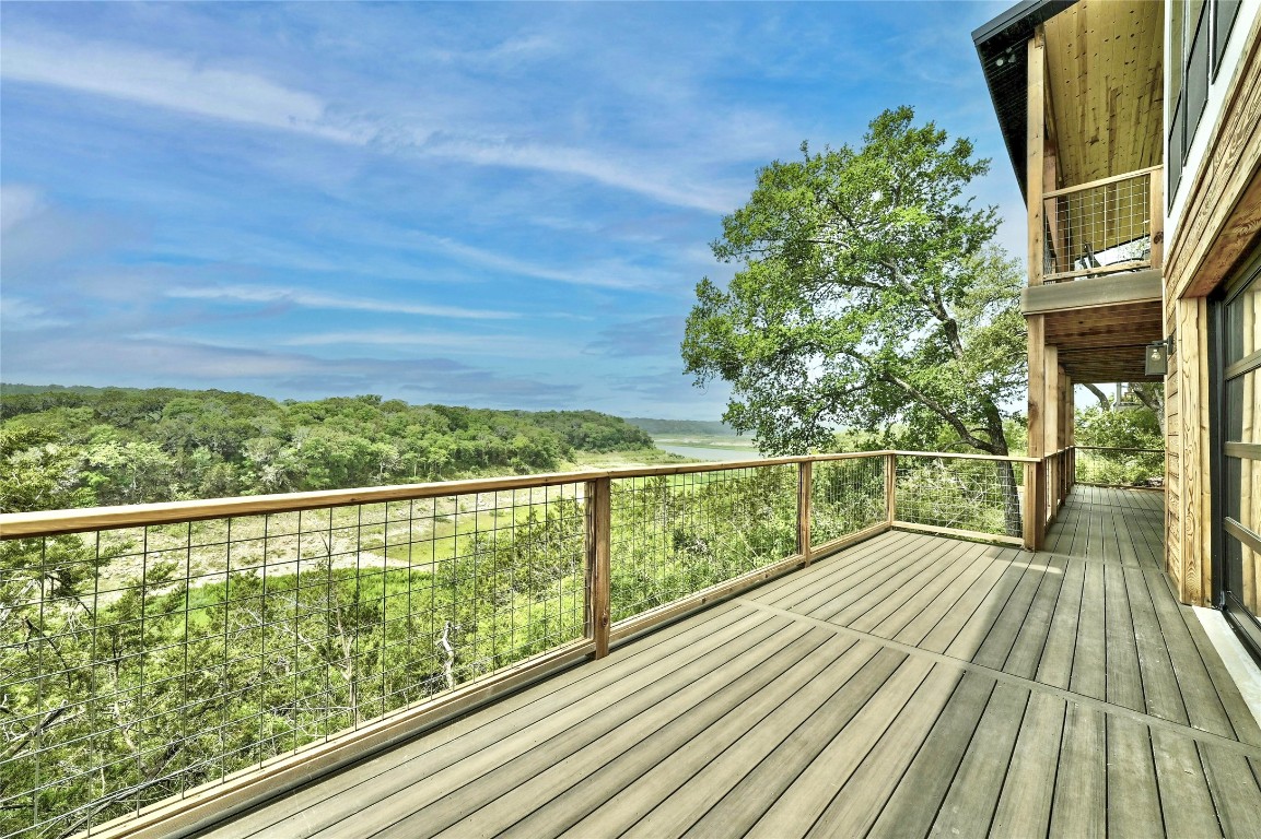 26701 Blue Cove Road Marble Falls, TX 78654 - Photo 23 of 27 a view of balcony with wooden floor