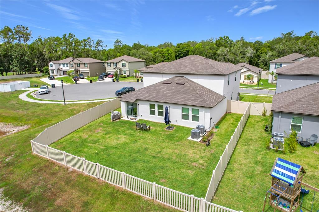 1633 Red Loop Lakeland, FL 33801 - Photo 46 of 60 a view of a house with a big yard