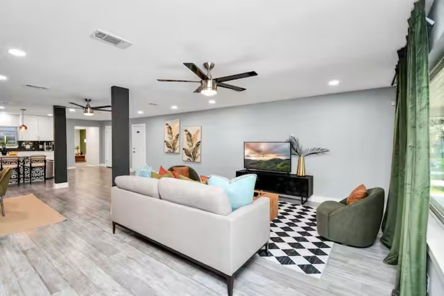 3318 Wichita Street Houston, TX 77004 - Photo 3 of 36 a living room with furniture and a ceiling fan