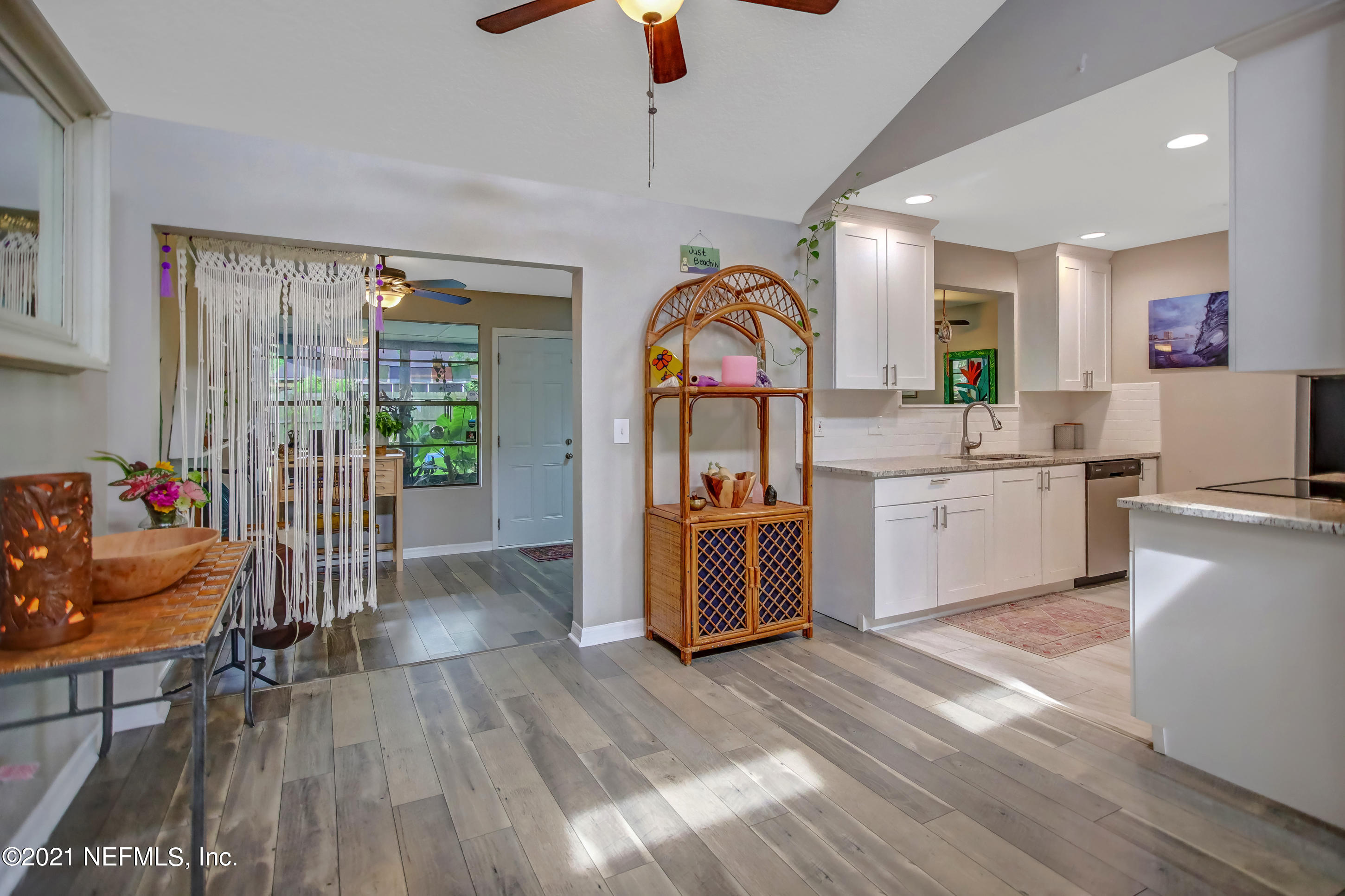 2587 Summer Tree Road East Jacksonville, FL 32246 - Photo 23 of 58 a very nice looking living room with a large window