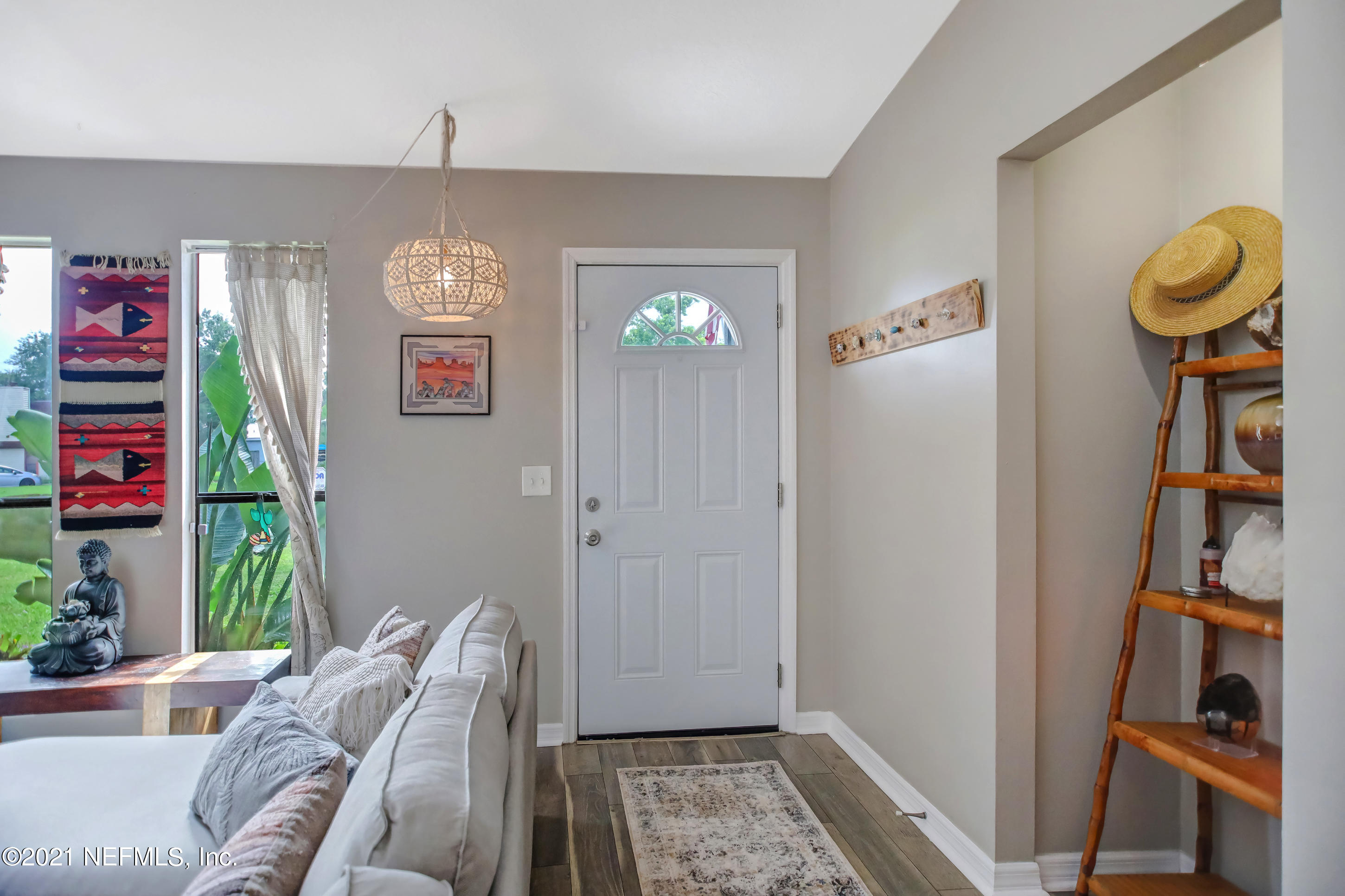 2587 Summer Tree Road East Jacksonville, FL 32246 - Photo 5 of 58 a view of hallway with furniture and a window